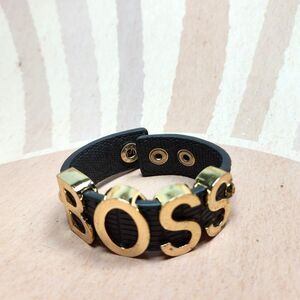 BOSS in Gold Letter Spell Out Bracelet Woman's Gray Embossed Snap Closure Band